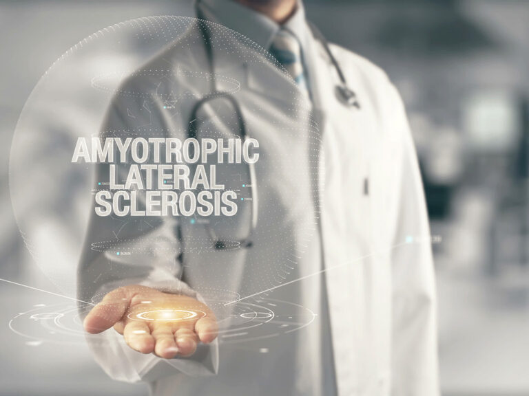 Doctor holding a glowing hologram that displays the words “Amyotrophic Lateral Sclerosis,” symbolizing ALS awareness and medical research.