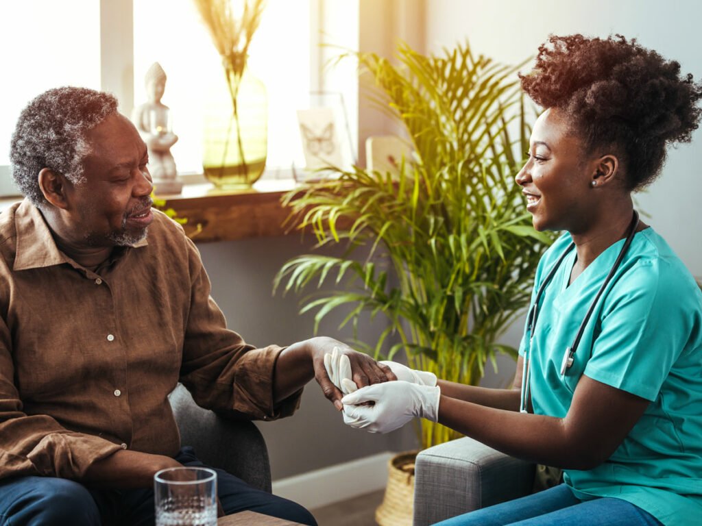 Compassionate Care in Action: An image of a male patient receiving comfort care from a female nurse, illustrating the human side of healthcare.