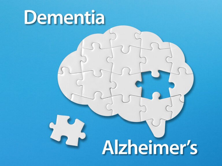 Illustration of a human brain with a missing puzzle piece symbolizing the challenges of Dementia and Alzheimer's disease.